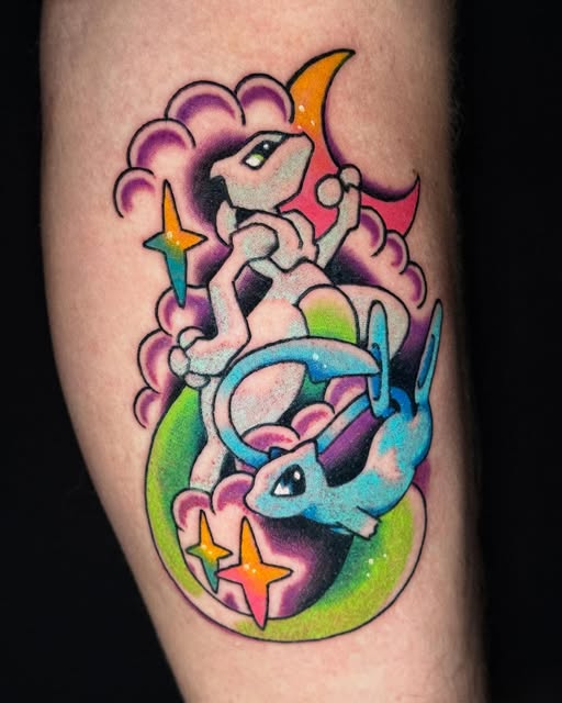 Pokémon Espeon and Kyogre tattoo on upper arm with purple clouds, rainbow stars, and green circular background in vibrant colors.