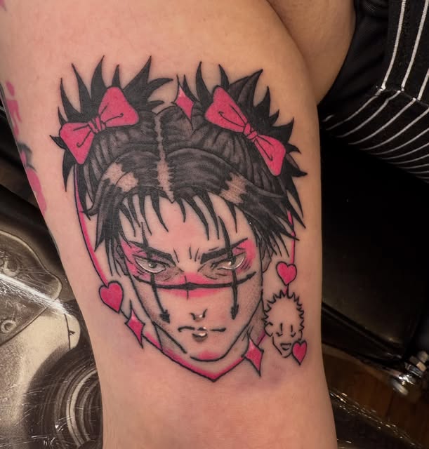 Spiky-haired anime character with pink bows and hearts tattooed on upper arm, featuring sharp facial features and small companion character detail.