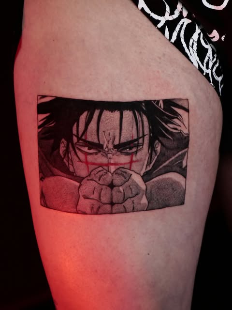 Yuji Itadori from Jujutsu Kaisen with fierce expression and clenched fists tattooed on upper thigh, rendered in black ink with red ambient lighting.