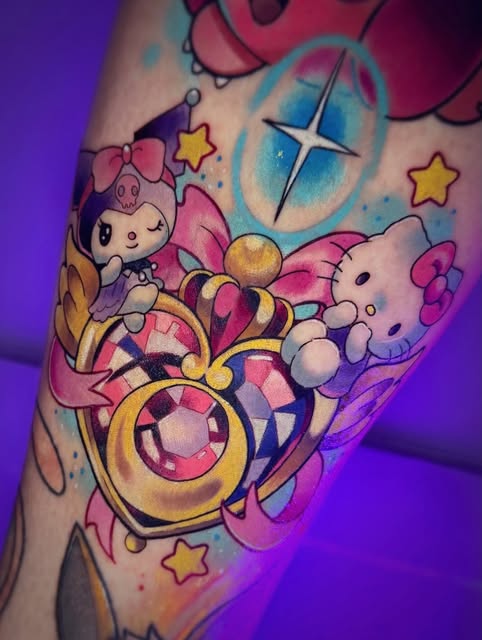 Sanrio Hello Kitty and friends tattoo on arm featuring pink characters, golden rings, stars, and a blue cross under purple lighting.