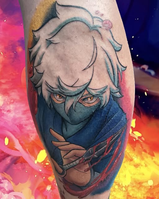 Anime character with white spiky hair and masked face wearing blue clothing, tattooed on upper leg with orange and blue accents.