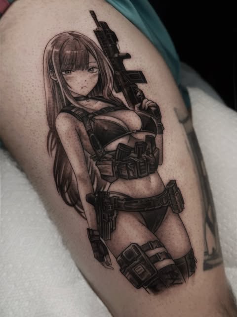 Anime girl character with long hair holding assault rifle and wearing tactical gear with ammunition belt, tattooed on upper thigh.