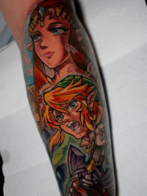 Naruto Uzumaki and a female character with orange hair displayed on a forearm sleeve tattoo in vibrant reds, oranges, yellows, and skin tones.