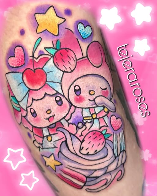 Strawberry Shortcake and companion characters with fruits, hearts, and stars tattooed on leg calf in pink, purple, and blue colors.