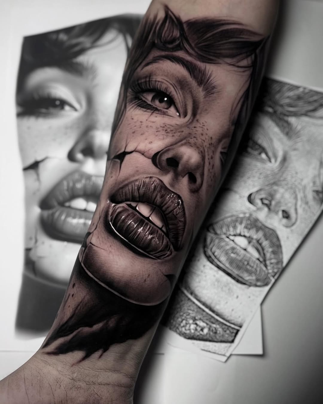 Black and grey portrait tattoo on forearm showing woman's face with expressive features and detailed shading.