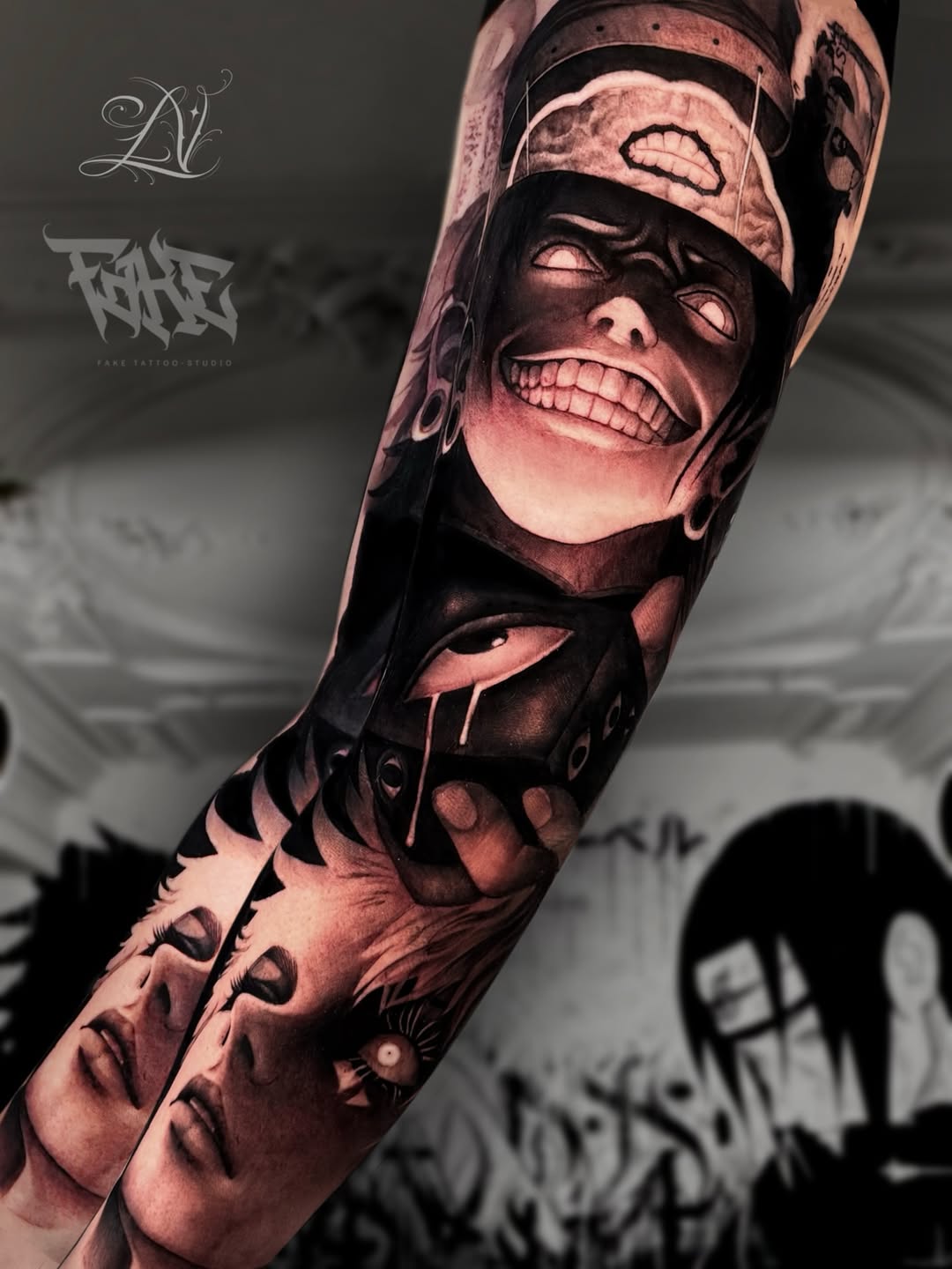 Black and grey sleeve tattoo featuring a grinning masked anime character, an eye with dripping tears, and layered faces below on forearm.