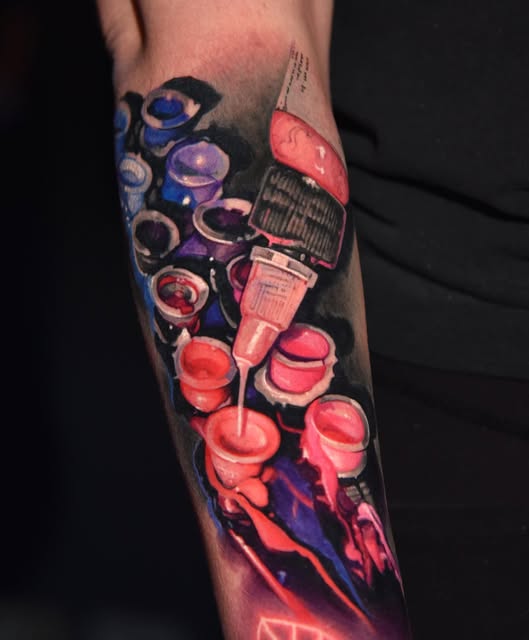 A microphone with red and blue neon-style lighting and floating bubbles rendered in color realism on the forearm.
