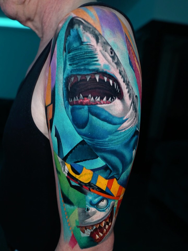 Two menacing sharks with open mouths wearing colorful striped belts on upper arm, vibrant painted lighting effects.