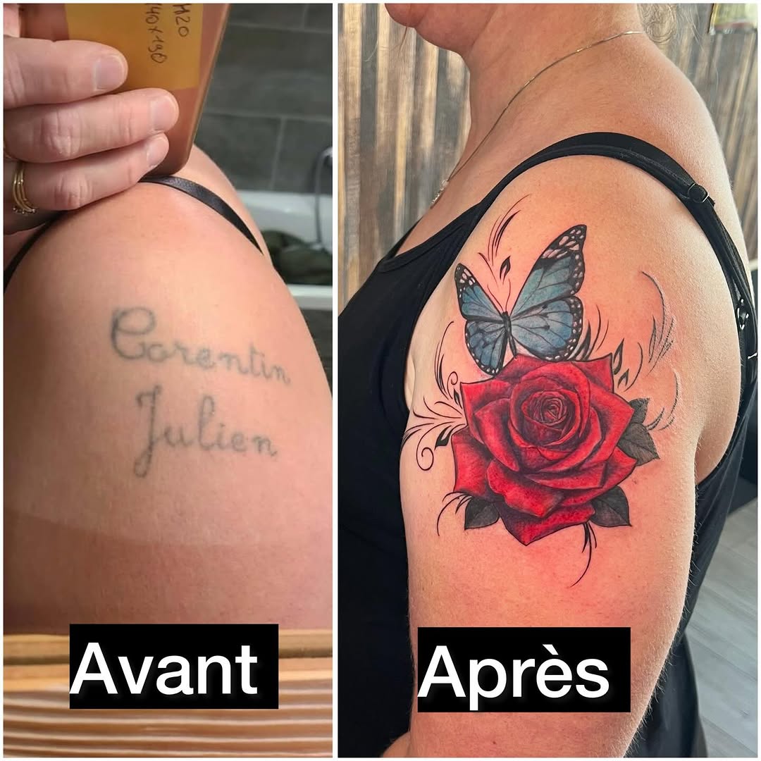 Rose with butterfly coverup tattoo on shoulder; replaces faded script text with vibrant red flower, blue butterfly, and decorative vines.