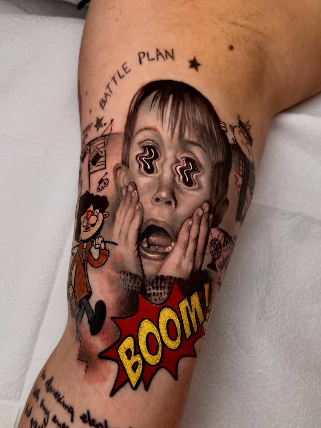 Surreal portrait with spiral eyes, cartoon character, comic book effects, and text on upper arm.