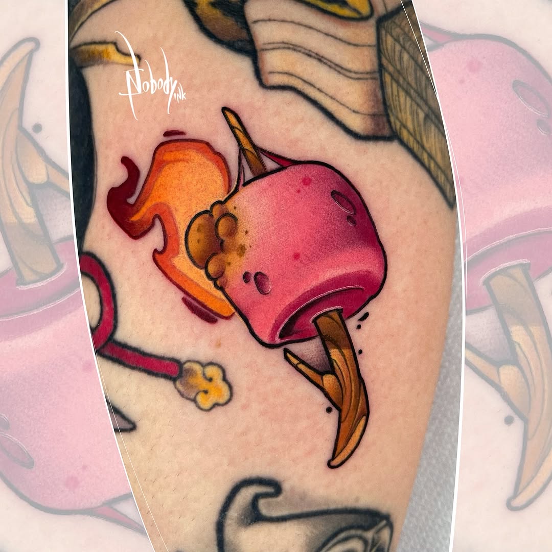Colorful candy apple with orange flame, pink body, and brown stick on upper arm with surrounding design elements.