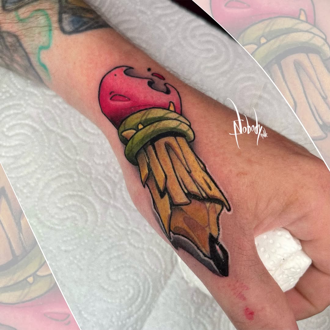 Paintbrush with pink bristles and wooden handle on inner forearm, with exaggerated 3D cartoon rendering and saturated color.
